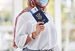 Covid, passport and travel with a muslim woman in airport for international or global traveling and tourism. Hand, documents and immigration with an islamic female passenger walking in a terminal