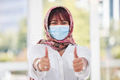 Buy stock photo Business woman, covid and thumbs up for workplace compliance, corona virus health policy and muslim in face mask. Islamic employee portrait with ok, like and thank you sign for covid 19 safety goals