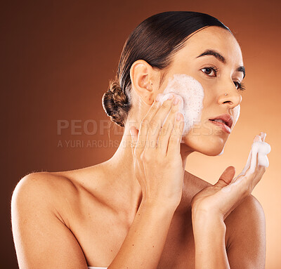 Buy stock photo Woman, face wash and soap on studio background, healthy skincare and natural cosmetics, body wellness and luxury makeup. Young model, facial cleaning and foam, self care and aesthetic of beauty shine