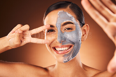 Buy stock photo Beauty, portrait and woman taking selfie with face mask and peace sign hand gesture in studio for skincare. Smile, peeling and happy girl model taking pictures in facial dermatology cosmetics cream 
