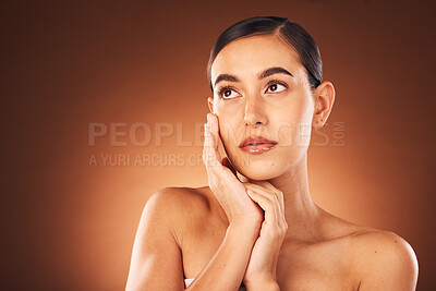 Buy stock photo Idea, skincare and woman with beauty makeup, spa wellness and self love glow against a brown studio background. Cosmetics, marketing and thinking model with luxury cosmetic care and dermatology
