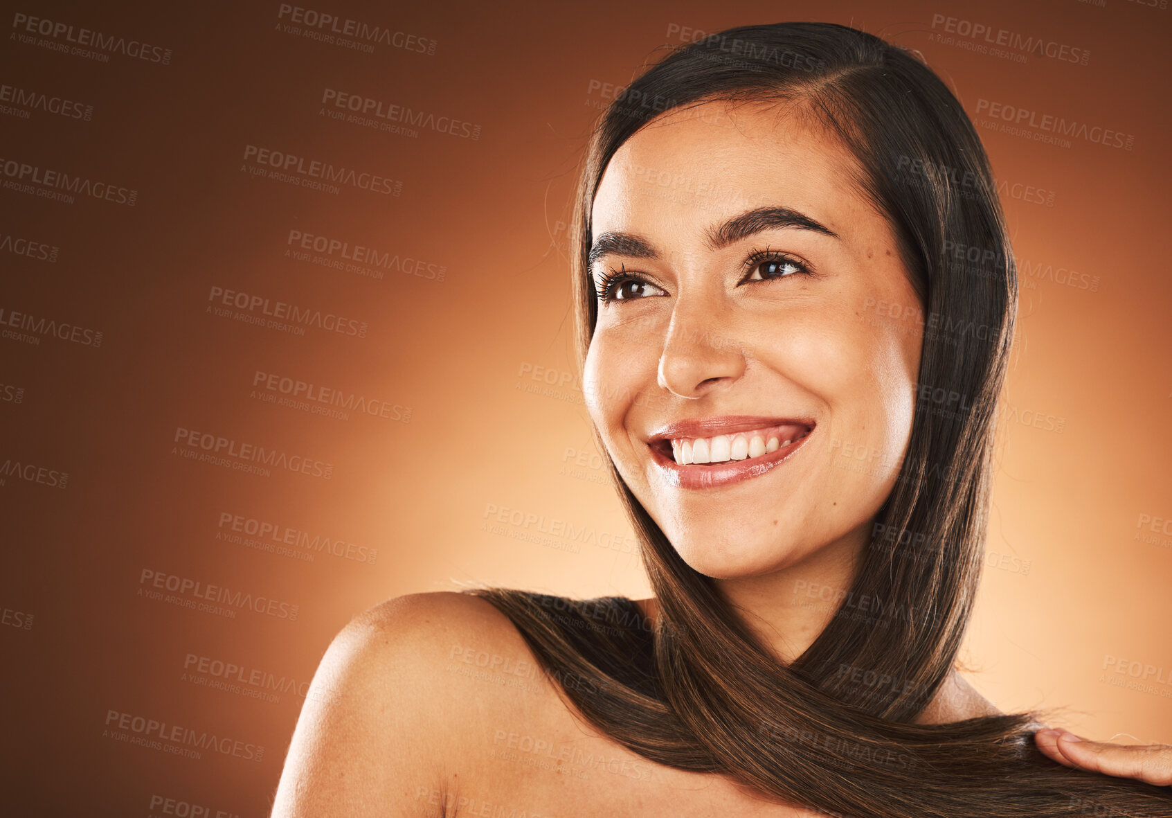 Buy stock photo Face, beauty and hair with a model woman in studio on a brown background thinking about keratin treatment with mockup. Haircare, cosmetics and idea with a young female posing to promote hair care