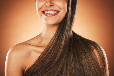 Buy stock photo Beauty, hair and keratin with a model woman in studio on a brown background for natural treatment. Wellness, luxury and salon with a female posing to promote a haircare product or shampoo