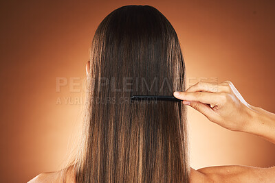 Buy stock photo Beauty, hair care and comb for maintenace, combing and self care routine with growth, shine and repair shampoo on a gradient background. Back of female for health, wellness and hairstyle in studio