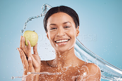 Buy stock photo Water, apple and beauty with black woman and splash from shower for cleaning, hygiene and skincare with vegan, healthy and wellness cosmetics. Fruit, water splash and cosmetic portrait and mock up.