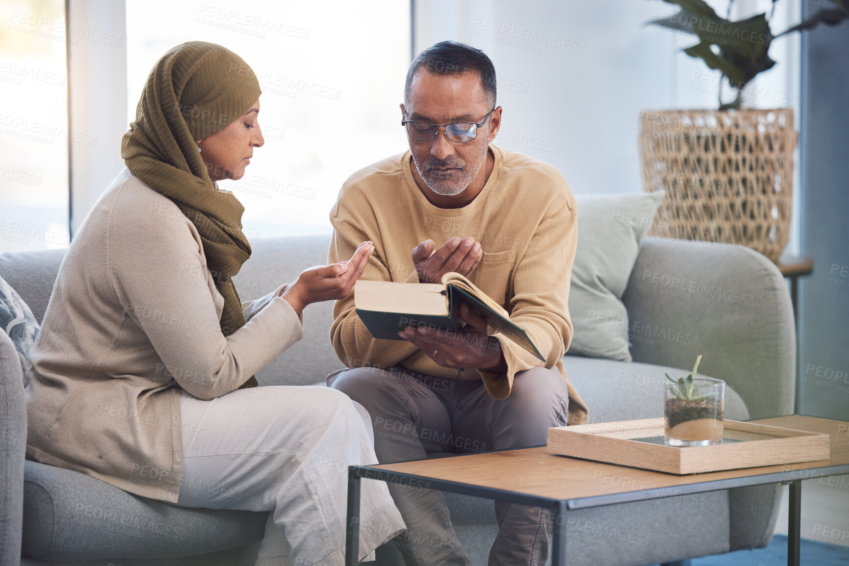 Buy stock photo Pray, Quran and muslim with couple for islamic religion for faith, worship and ramadan kareem celebrations. Muslim pray, God and eid mubarak with man and woman with holy book for spiritual belief 