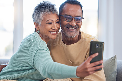 Buy stock photo Senior couple and phone selfie for wellness on pension together at happy home in Mexico. Love, marriage and retirement people relax on sofa with happy smartphone photograph for bonding.