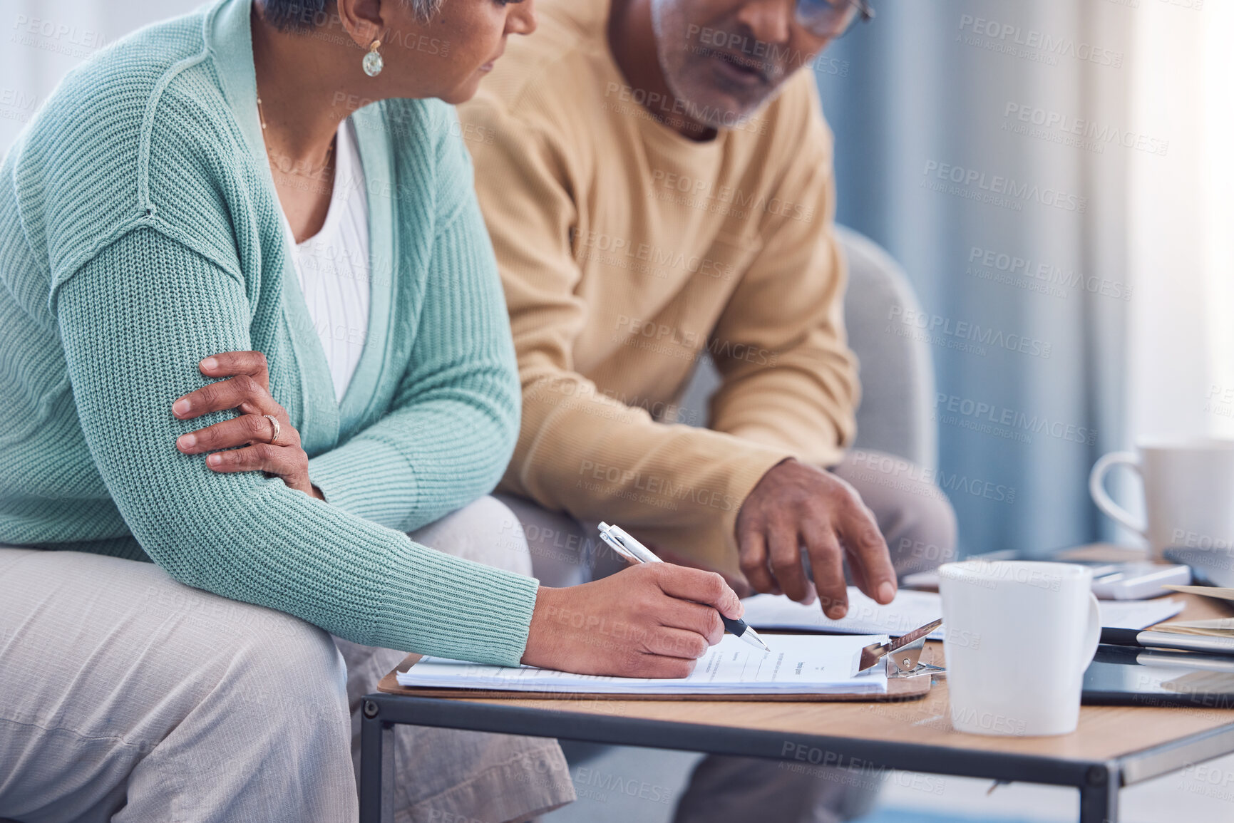 Buy stock photo Senior couple, documents and sign contract for life insurance or home mortgage. Discussion, signature and retired elderly man and woman signing legal paperwork for will or loan application together.