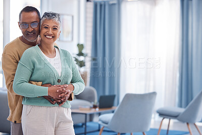 Buy stock photo Senior couple, love and hug with space in home living room with a smile, happiness and care portrait for marriage mockup. Portrait of a indian man and woman together for support in retirement