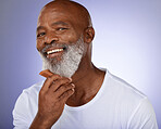 Senior, black man and grooming beard portrait or cleaning face for skincare wellness and beauty hygiene products. Elderly, male model and natural facial hair with comb in purple background studio