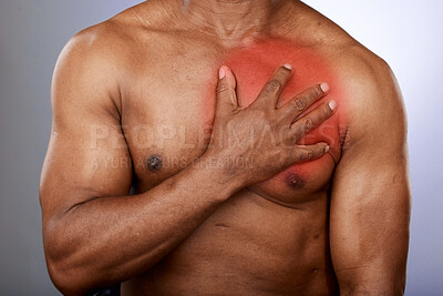 Buy stock photo Heart attack, pain and black man with hand on chest in studio for heart health, medical care and stroke. Cardiology, healthcare and male holding torso with inflammation from cardiovascular disease