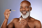 Portrait, skincare and black man with oil serum cosmetics for acne, wrinkles or anti aging protection in studio. Face, senior or old man marketing an essential oil bottle or natural luxury product 