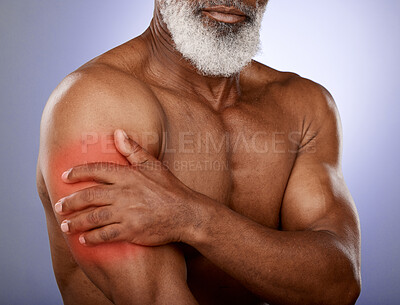 Buy stock photo Senior, pain and black man with arm muscle inflammation from athlete bicep or workout injury. Athletic, injured and mature model touching muscular body tension with purple studio background.