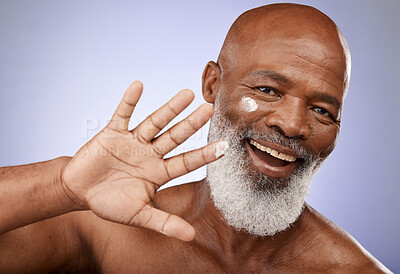 Buy stock photo Skincare, cream and senior black man in studio beauty, cosmetics or face product promotion, marketing or advertising. Happy portrait of elderly model with facial, sunscreen or dermatology application