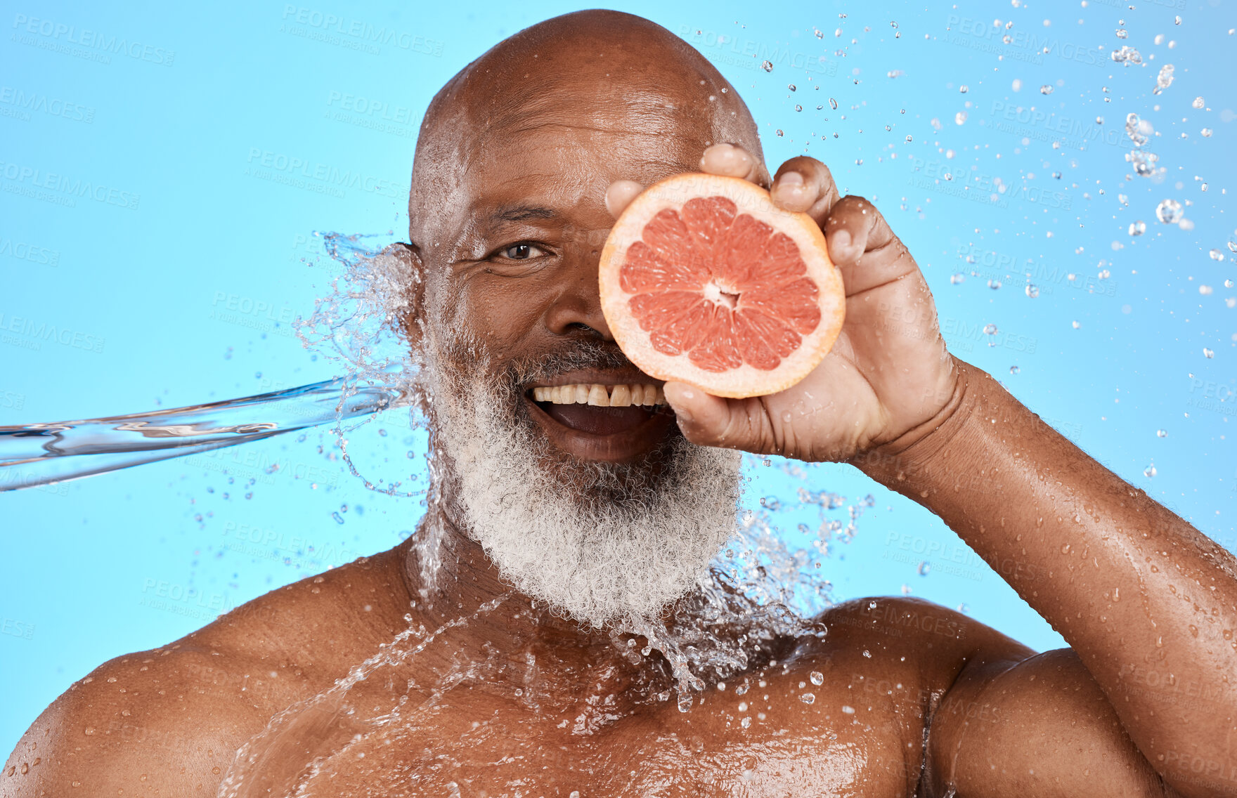 Buy stock photo Grapefruit, portrait and senior black man in studio with water splash for bathroom product, skincare and vitamin c health promotion. Smile face, fruit and an african elderly model  with facial glow