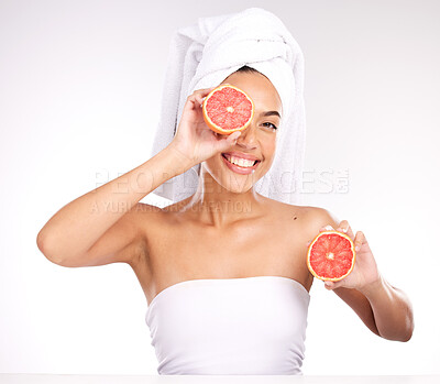 Buy stock photo Woman, face skincare or grapefruit in grooming routine, healthcare wellness or vitamin c dermatology on studio white background. Portrait, smile or happy Brazilian beauty model and citrus facial help