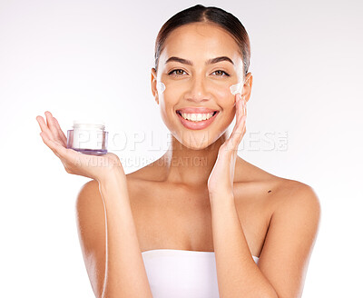 Buy stock photo Beauty, skincare and face cream for woman with dermatology product glow, health and wellness on white studio background. Portrait of Colombia model with smile and happy for result of cosmetic mockup