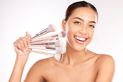Buy stock photo Beauty, makeup and brush with portrait of woman for product, facial and salon. Smile, luxury and cosmetics with foundation tool and girl model for cosmetology, application or care in white background