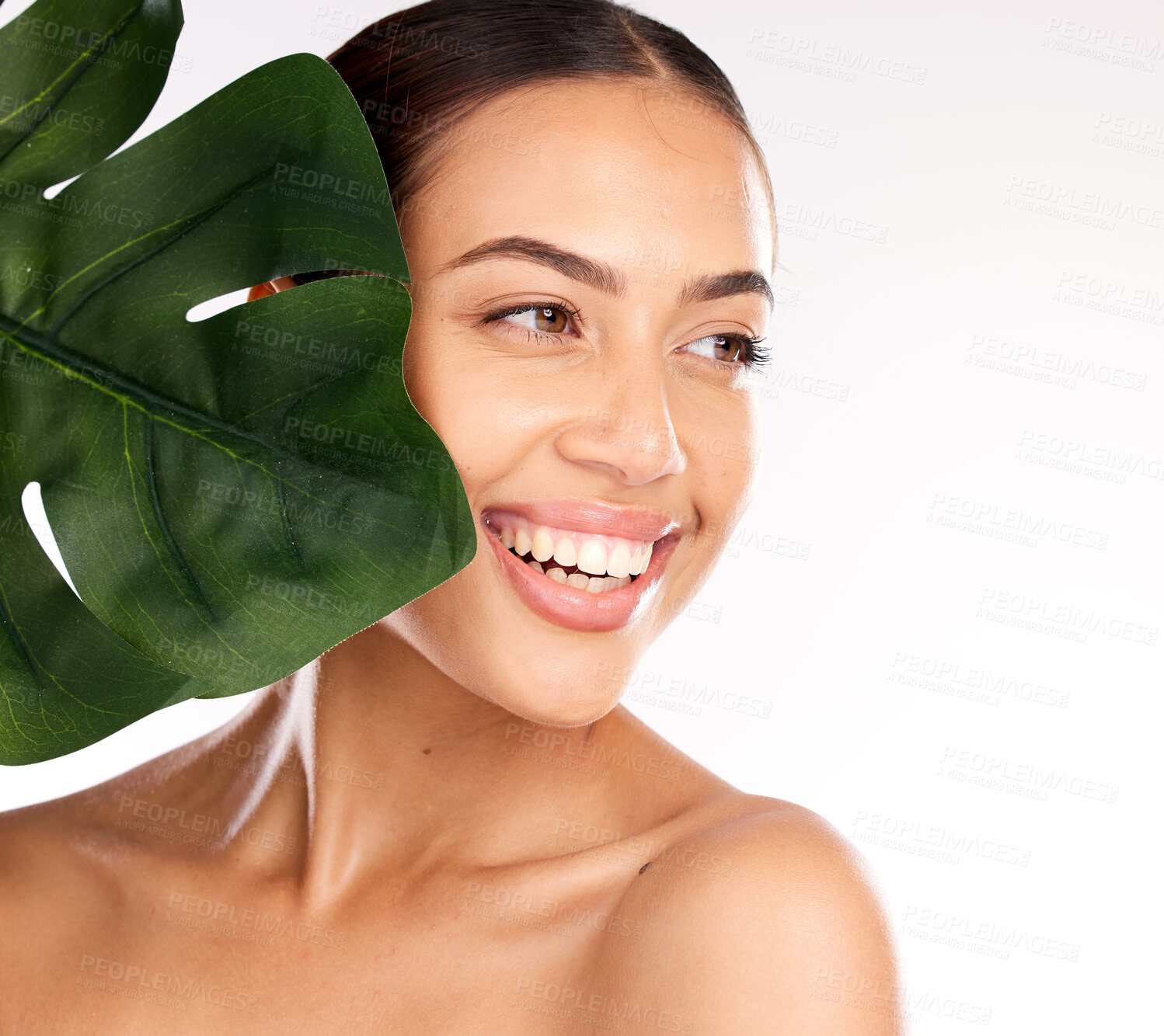 Buy stock photo Woman, face or skincare glow with plant in organic healthcare wellness, vegan dermatology or healthy Brazilian cosmetics. Smile, happy or beauty model with monstera leaf on studio background mock up