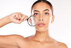 Woman, magnifying glass and skincare portrait for beauty wellness or healthy facial care in studio. Model face, Luxury spa cleaning and cosmetics makeup, check skin glow and natural dermatology