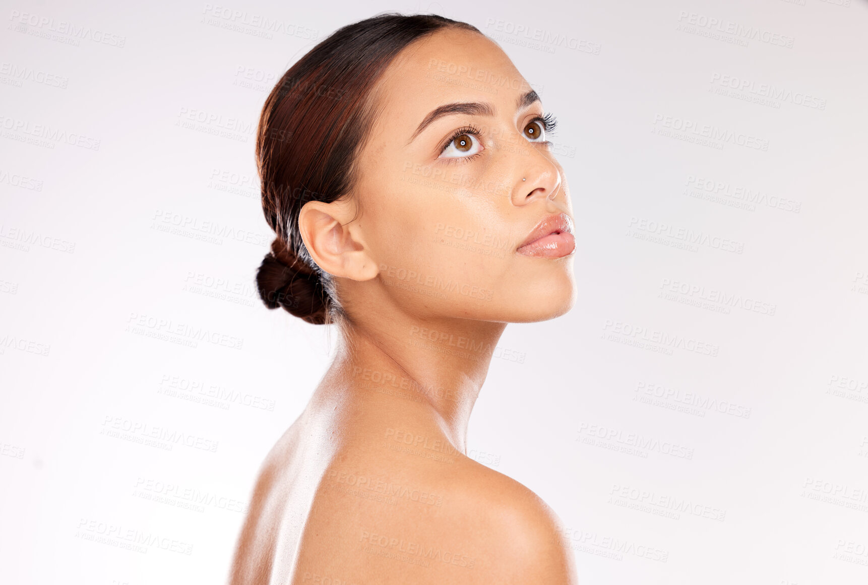 Buy stock photo Beauty, skincare and woman face glow from Brazil feeling healthy after skin wellness facial. Serious model with body shine after dermatology, luxury spa and cosmetics treatment for wellbeing