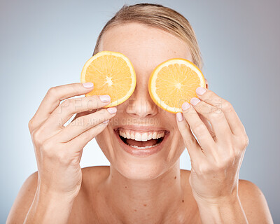 Buy stock photo Lemon, eyes and skincare woman in studio for cosmetics, makeup and health of nutrition benefits and results promotion. Happy model with fruits for vitamin c on skin care, dermatology and facial