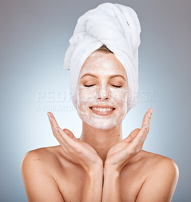 Buy stock photo Woman, beauty and smile for skincare face mask, cosmetics or cream against a grey studio background. Female model smiling with teeth for facial cleanse, detox or clean cosmetic skin hygiene on mockup