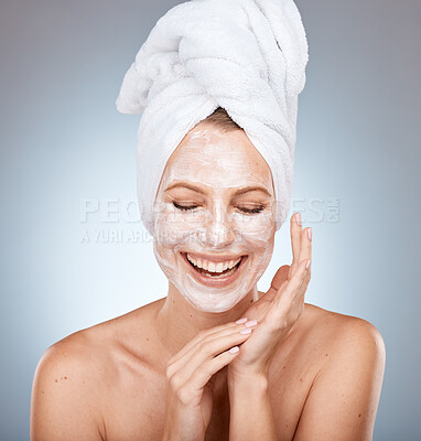 Buy stock photo Beauty mask, facial and skincare with woman in studio with happiness for cosmetics, glow and dermatology product on grey background,. Face of Canada model with smile for clean, fresh and healthy skin