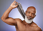 Shower, cleaning and senior black man grooming, hygiene and body wellness from a spa sauna on a purple background in studio. Retirement glow, self care and portrait of an elderly model from bathroom