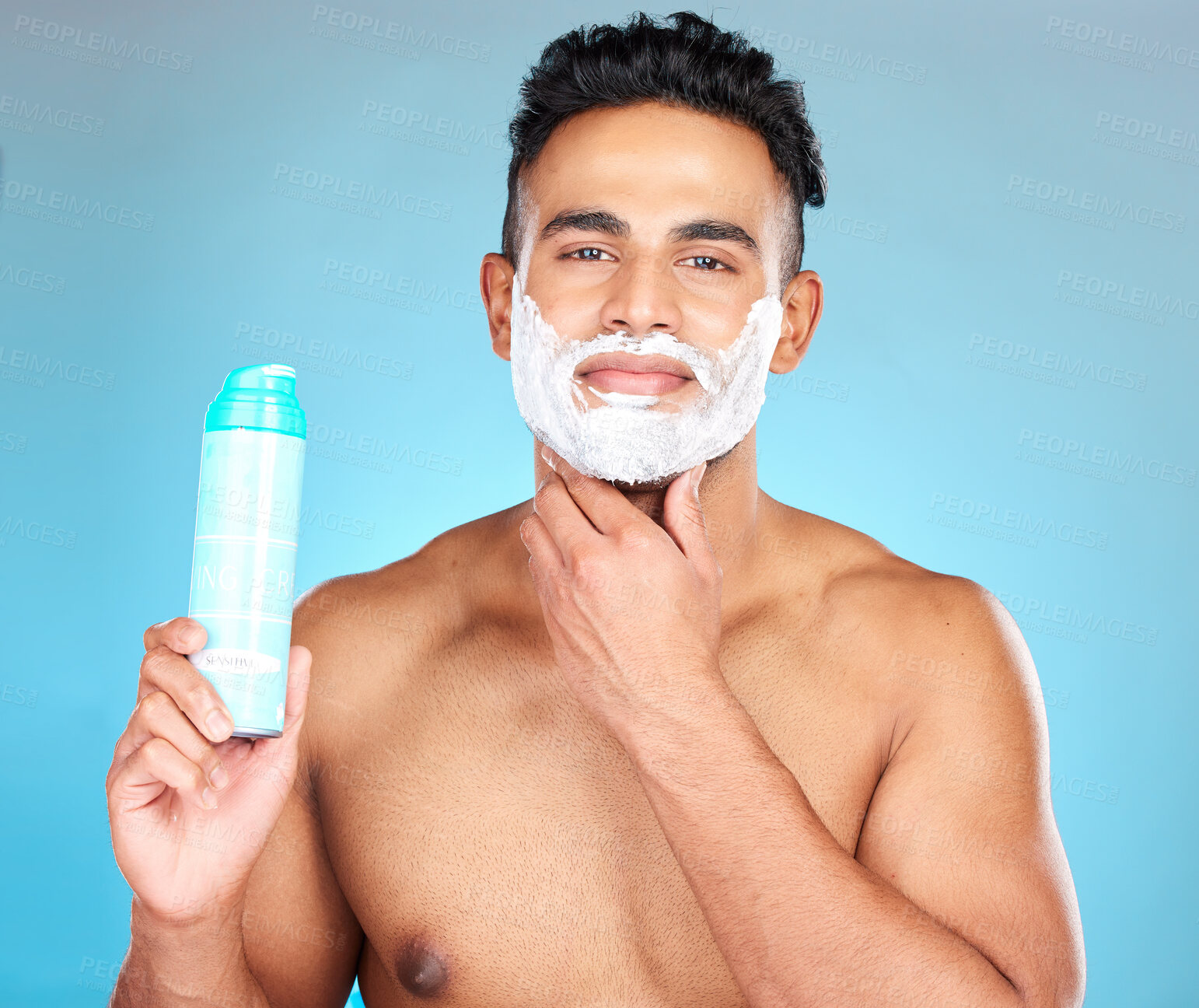 Buy stock photo Face, skincare and man with shaving cream product in studio isolated on a blue background. Beauty, hair care and male model from Brazil with shave gel for beard grooming, cleaning and facial hygiene.