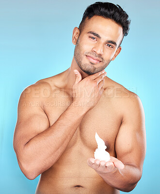 Buy stock photo Foam, shave and man portrait with cream for epilation, beauty and skincare or haircare on a blue studio background. Beard, mousse and hair removal with a male for shaving his facial hair 