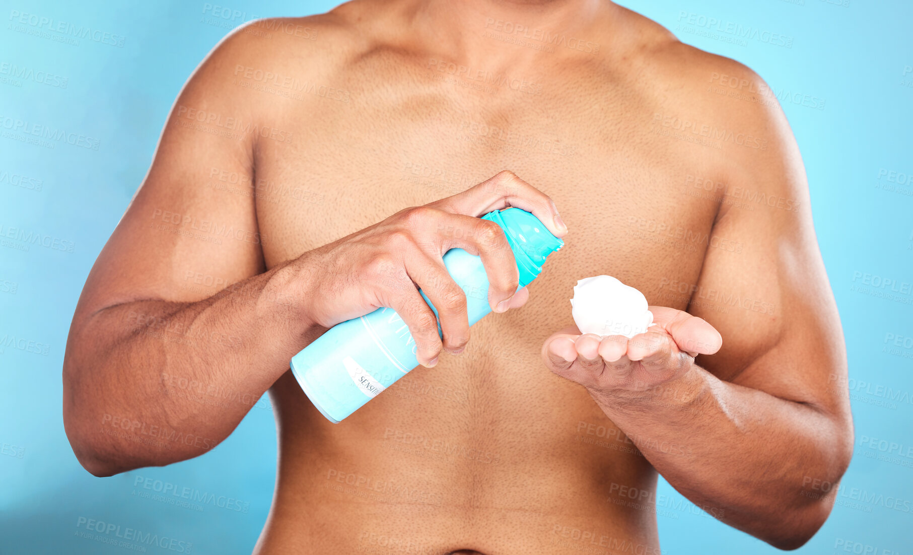 Buy stock photo Shaving cream, hand and man with foam for hair removal, grooming or epilation in a studio. Product, skincare and closeup of mousse to shave a facial beard or body hair isolated by a blue background.