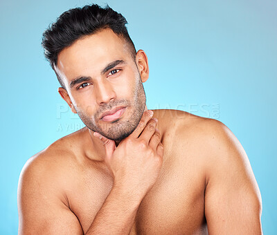 Buy stock photo Beauty, skincare and grooming with portrait of man for facial, wellness and luxury. Product, cosmetics and cleaning with face of model for glow, beard routine and self care in blue background studio