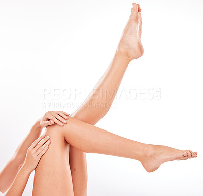 Buy stock photo Skincare, legs and woman in studio for wellness, relax and soft, natural skin against a white background mockup. Beauty, leg and girl model hand on smooth, perfect and feminine, luxury and grooming