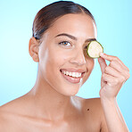 Face, cucumber and facial skincare, happy smile and vegan or healthy product marketing or advertising space. Happy model with vitamin c fruits for skin care glow, happiness and self care for skin