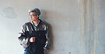 portrait young asian man student wearing stylish silver jacket with concrete wall in city