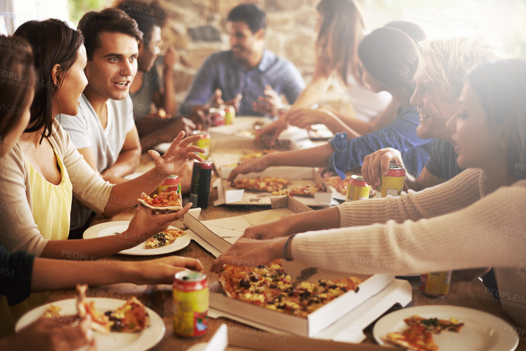 Buy stock photo Fast food, pizza and party with a friends at a restaurant in celebration of a birthday or event together. Cafe, diversity and eating with a man and woman friend group sitting around a table for food