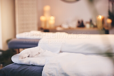 Buy stock photo Spa, massage bed and blurred background with candles, bokeh and room for health, wellness and treatment. Physical therapy table, luxury resort or beauty salon for body care, relax or peace in Bangkok