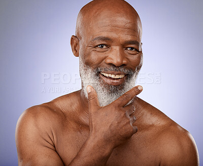 Buy stock photo Portrait, black man and facial skincare in studio for personal hygiene, clean face and natural cosmetics on grey background. Happy guy, mature male beauty and wellness spa for body care in Nigeria