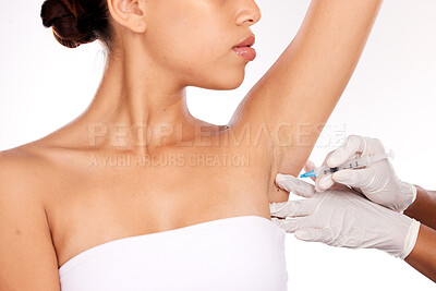 Buy stock photo Beauty, armpit and injection for wellness aesthetic and professional treatment of hyperhidrosis. Plastic surgery doctor with cosmetic under arm botox syringe for girl patient in white studio.

