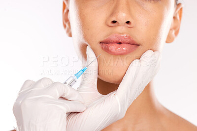 Buy stock photo Doctor hand, botox and woman with collagen, needle and face in studio background. Plastic surgery, lip filler and cosmetic lip injection for youth for skincare, natural look and medical expert