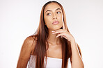 Hair care, thinking and woman in studio for beauty, natural makeup and cosmetics ideas with marketing or advertising space. Beauty salon, hairdresser and young model with hair growth inspiration