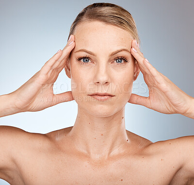 Buy stock photo Beauty, skincare and portrait of woman in studio on gray background for wellness, facial treatment and spa. Dermatology, aesthetic and girl with hands on face for cosmetics, healthy and natural skin