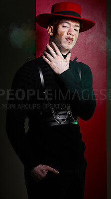 Buy stock photo Fashion, stylish and portrait of man model posing in studio with luxury, trendy and fancy outfit. Elegant, style and guy with vitiligo with modern, edgy and cool clothes by red and black background.