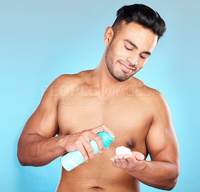 Buy stock photo Skincare, man and shaving cream for wellness, smooth and clear skin with blue studio background. Latino male, natural beauty and cosmetics to shave facial beard, grooming for hair removal and mousse.