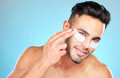 Buy stock photo Man, hands and face with eyes patch for skincare portrait, beauty wellness or luxury spa cosmetics. Model, smile and happy in studio for dermatology care, eye care make product and facial cleaning