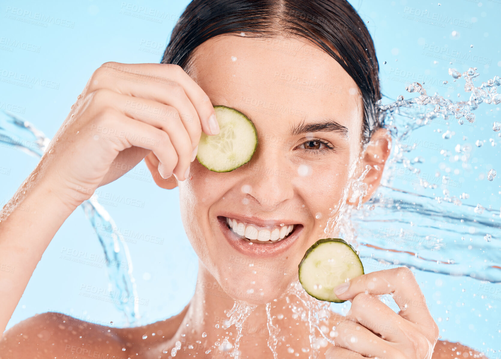 Buy stock photo Water splash, cucumber and beauty woman portrait of a model feeling happy about natural skincare. Cosmetic, organic facial dermatology and nutrition of a person with happiness from face cleaning 