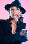 Portrait, fashion and beauty with a model black woman in studio on a pink background for contemporary clothes. Face, hat and style with an attractive female posing to promote an edgy clothing brand