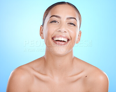 Buy stock photo Skincare, beauty and portrait woman laughing with happy smile on blue background. Makeup, cosmetic glamour and luxury skin care with beautiful smiling face, natural cosmetics for lady from Brazil.