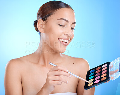 Buy stock photo Makeup, cosmetics and woman with face brush and product happy about skincare and beauty. Model with happiness about luxury color cosmetic and eye cosmetology ready for self care with a smile